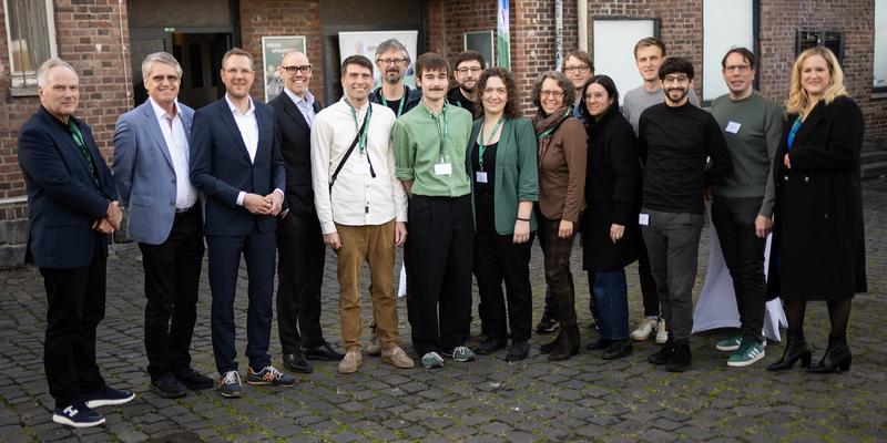 Group of persons of Krisopolis-Team together with politicians.